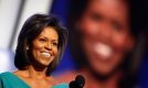 Мишел Обама убеждава американците, че съпругът й е един от тях