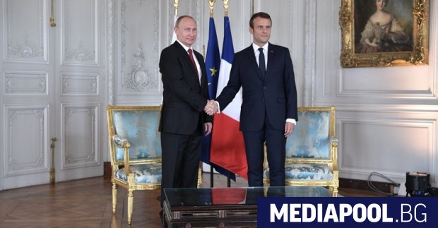 Путин и Макрон по време на миналогодишното посещение на руския